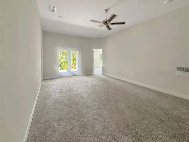 a view of room with window and stairs