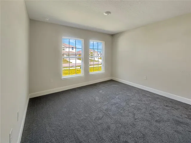 an empty room with window