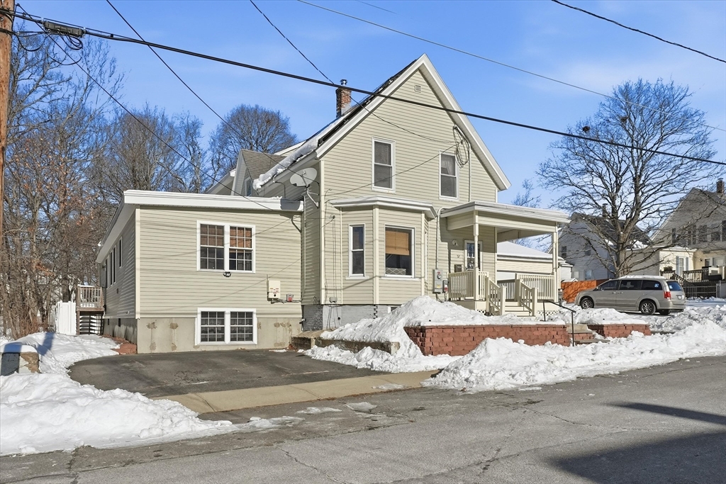 52 Church Street Gardner, MA 01440 - Photo 2 of 36 a view of a white house with a large tree