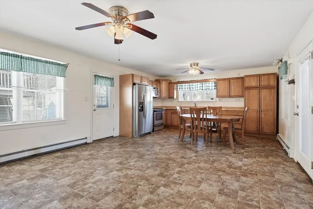 a view of a dining room with furniture
