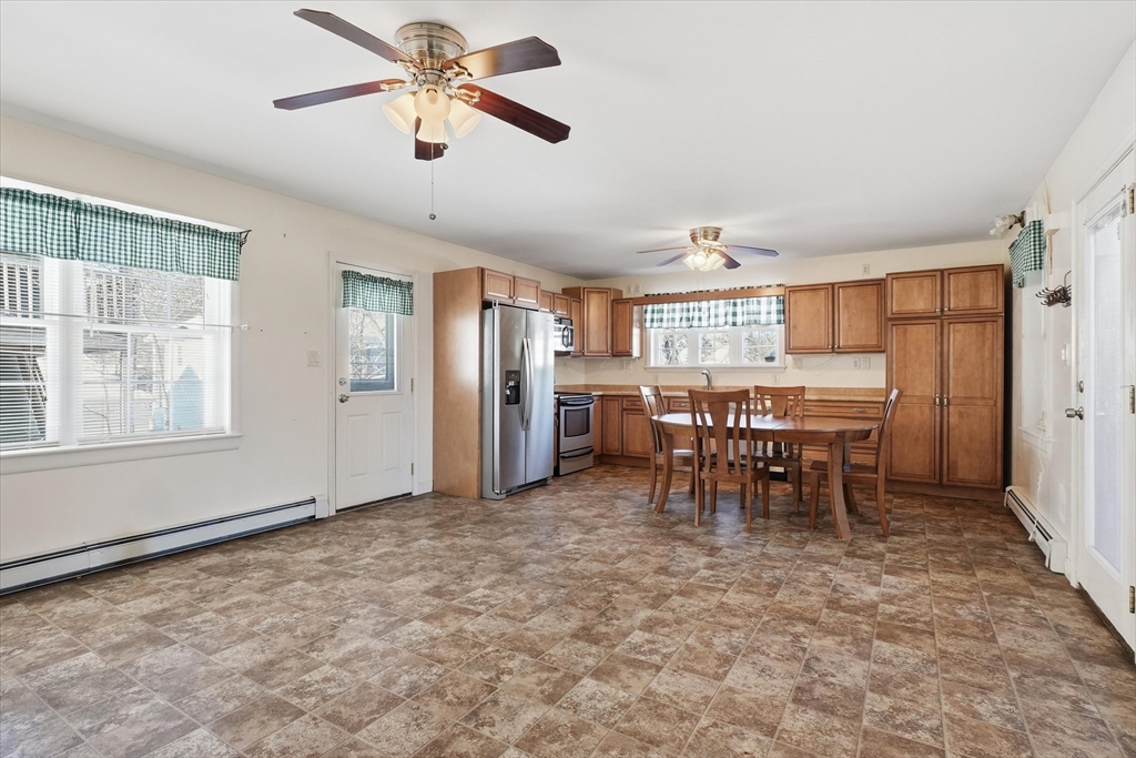 52 Church Street Gardner, MA 01440 - Photo 21 of 36 a view of a dining room with furniture
