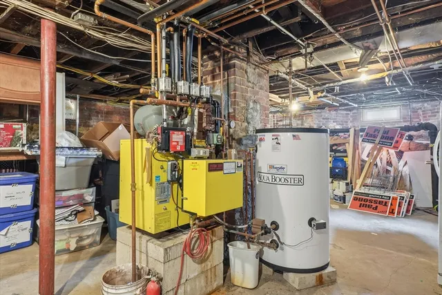 a view of a storage room with a view of storage and utility room