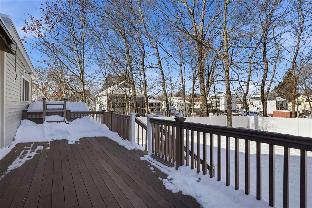 52 Church Street Gardner, MA 01440 - Photo 30 of 36 a view of a patio with wooden fence and a bench