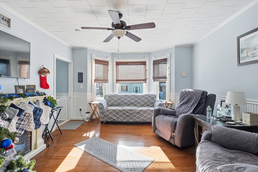52 Church Street Gardner, MA 01440 - Photo 4 of 36 a living room with furniture and a large window