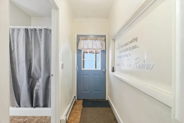 a bathroom with bathtub and shower