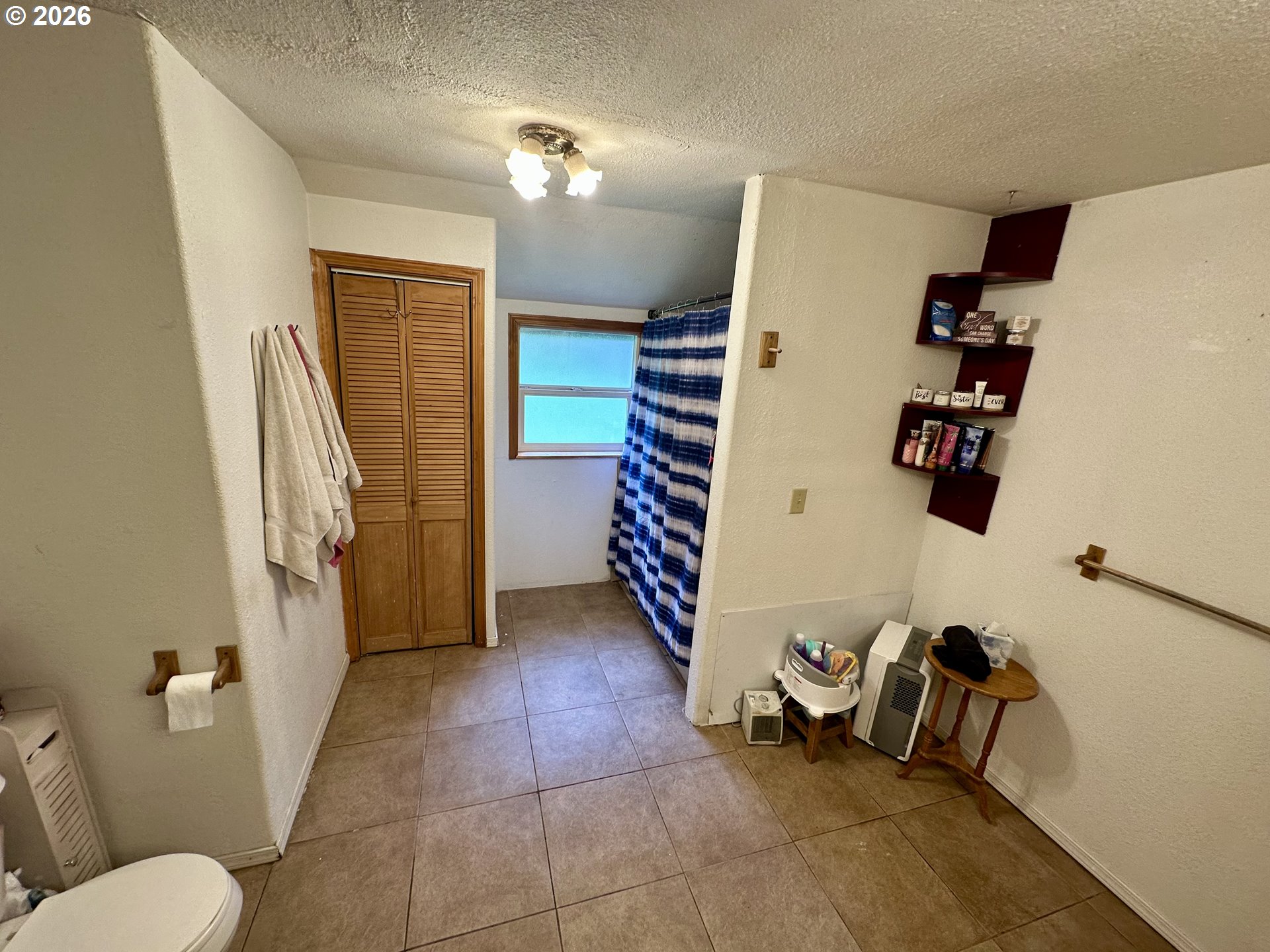 1910 Otter Slough Road Reedsport, OR 97467 - Photo 13 of 39 a bathroom with a sink and a shower