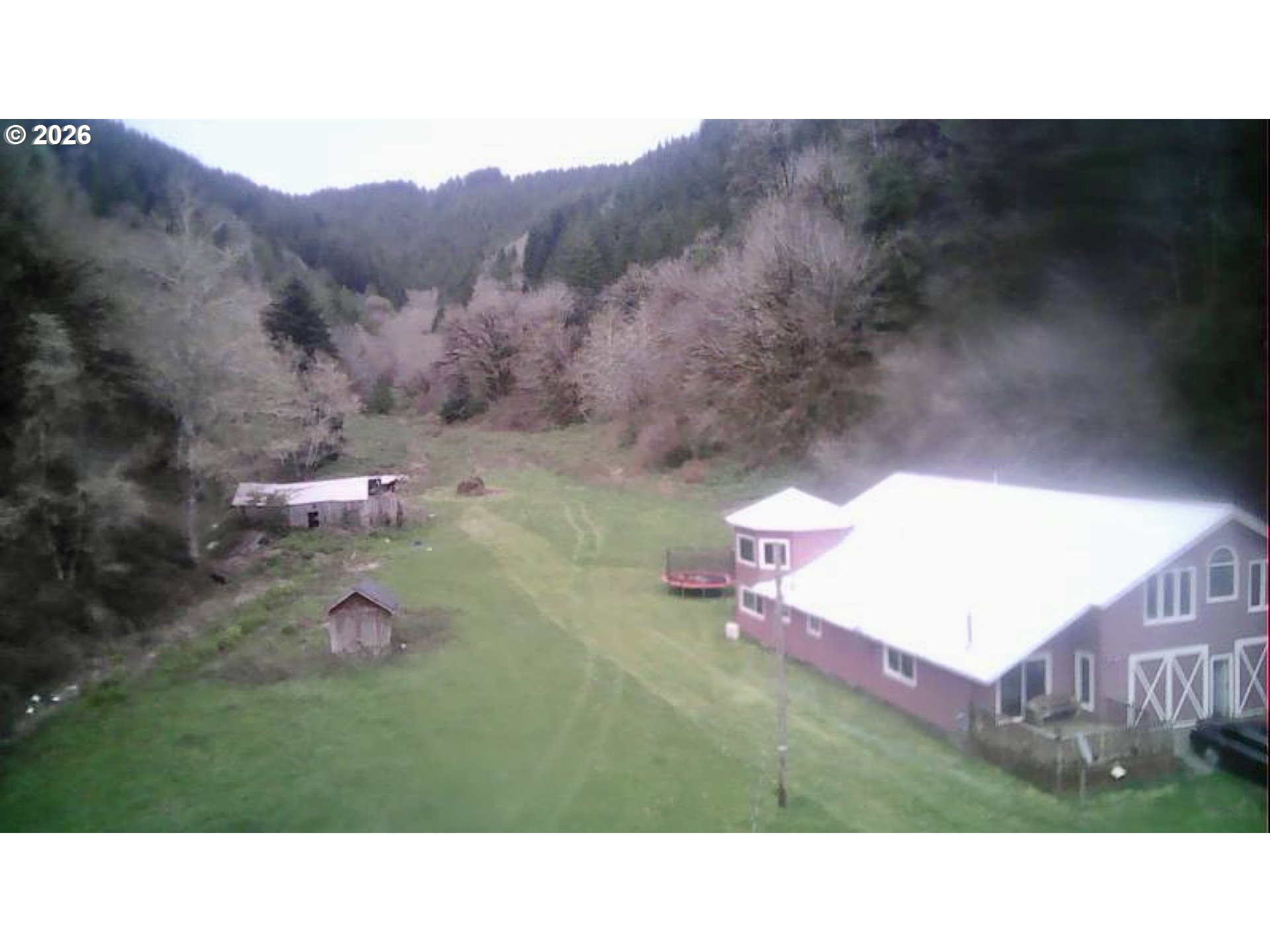 1910 Otter Slough Road Reedsport, OR 97467 - Photo 34 of 39 a outdoor view having yard