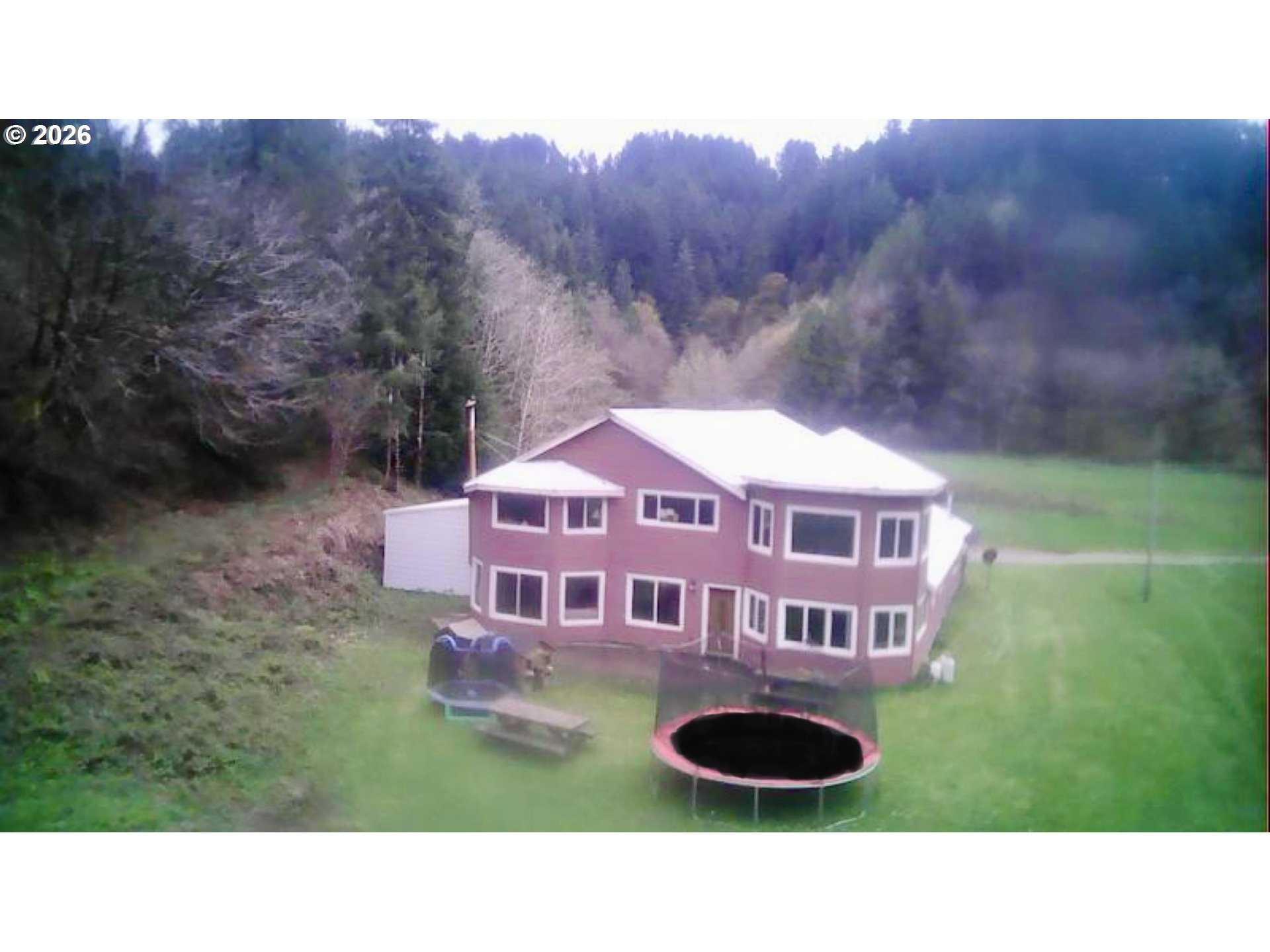 1910 Otter Slough Road Reedsport, OR 97467 - Photo 35 of 39 a aerial view of a house