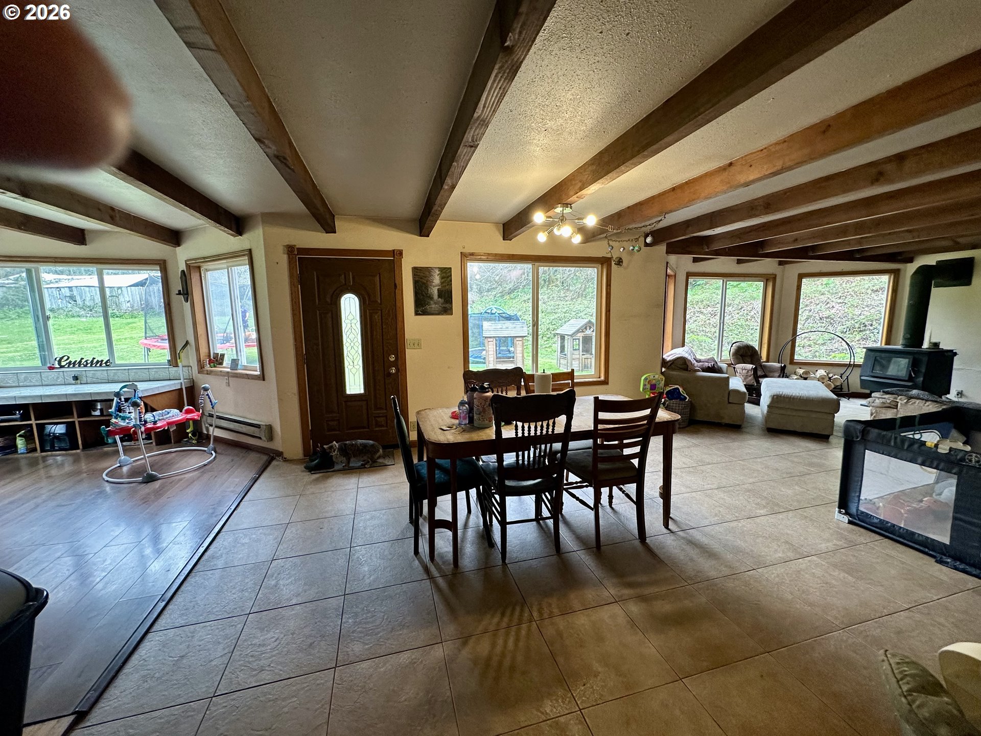 1910 Otter Slough Road Reedsport, OR 97467 - Photo 6 of 39 a lobby with furniture and a large window