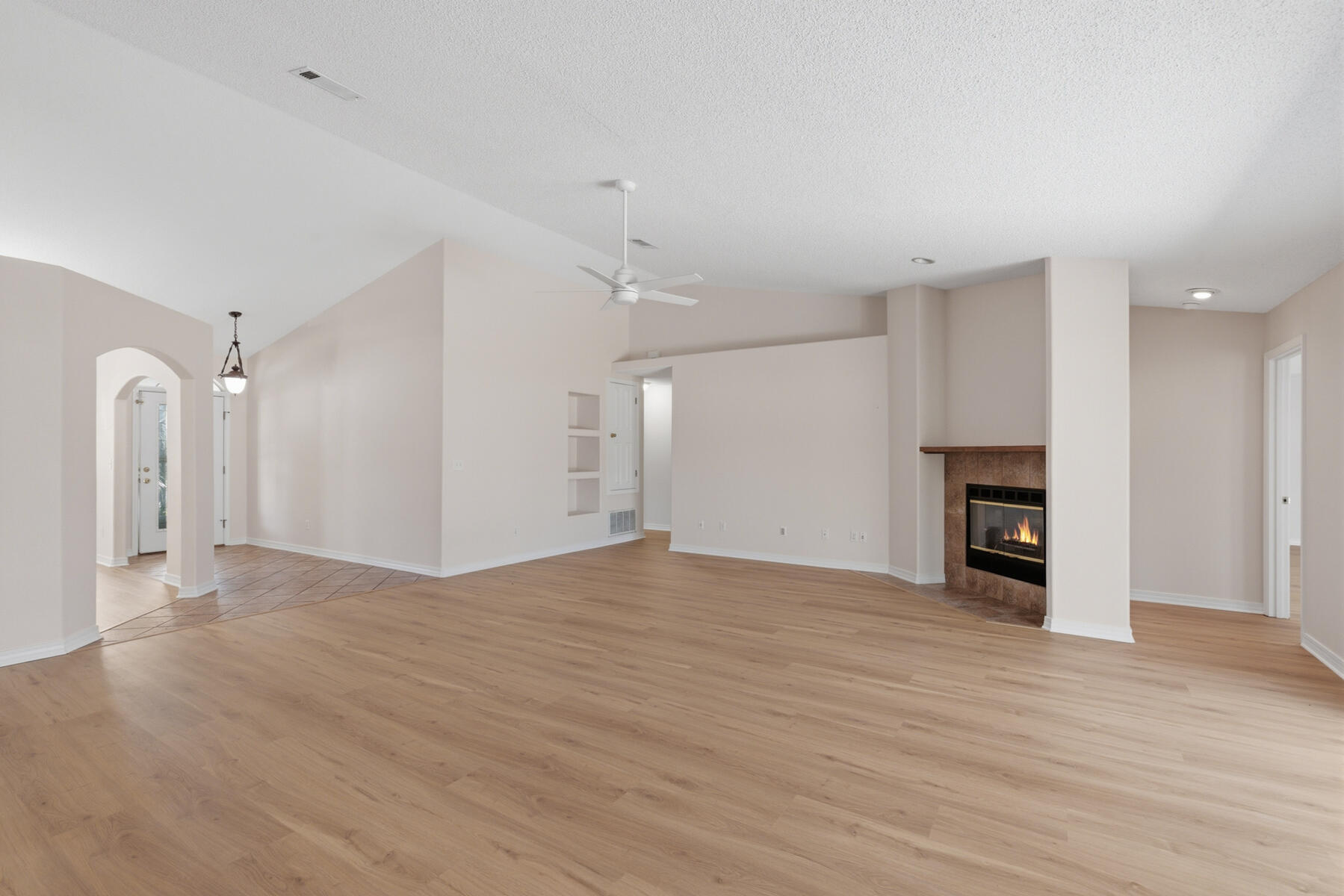 2775 Riverside Landing Drive Navarre, FL 32566 - Photo 13 of 25 Very Large Living Room with sliding glass doors and view to back yard.
