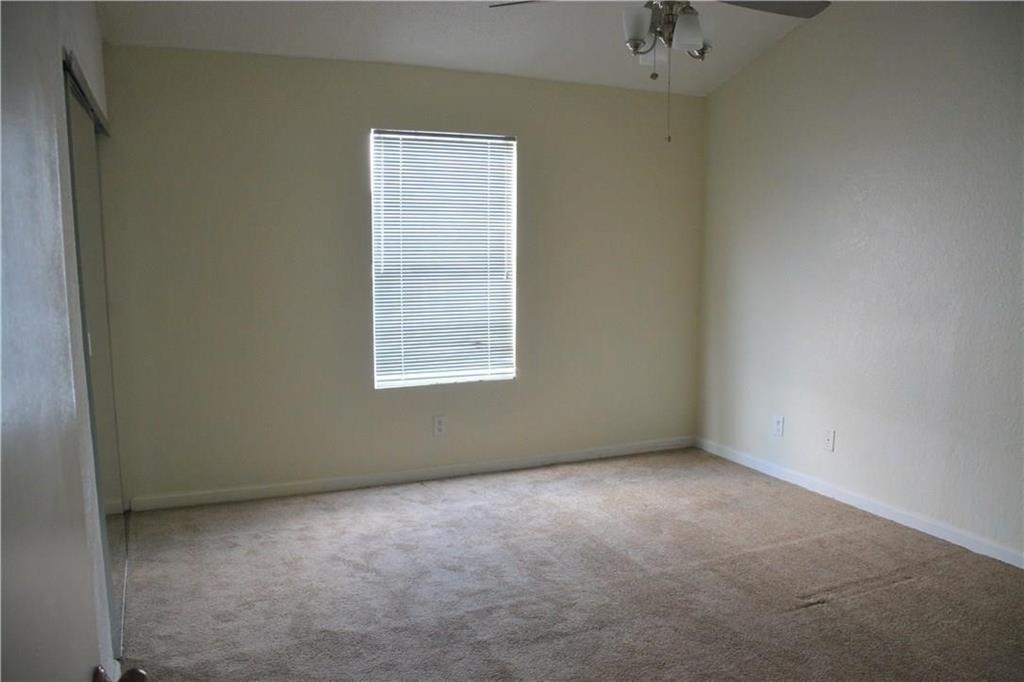 2400 Jupiter Road, Unit A3 Plano, TX 75074 - Photo 11 of 16 an empty room with a window