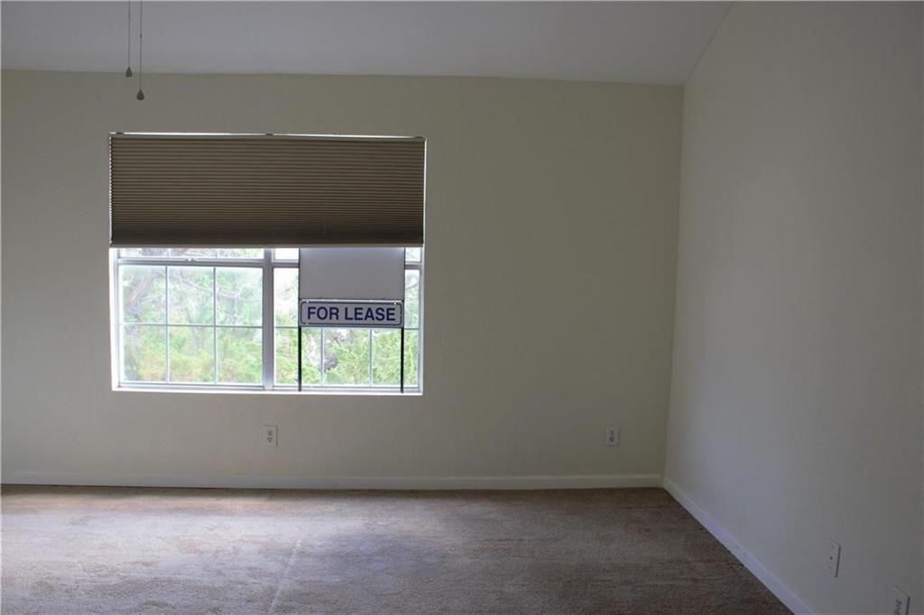 2400 Jupiter Road, Unit A3 Plano, TX 75074 - Photo 15 of 16 an empty room with a window