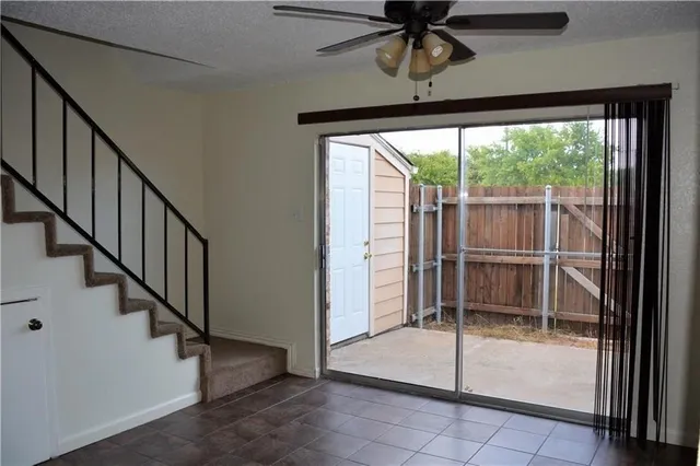 a view of entryway with wooden floor