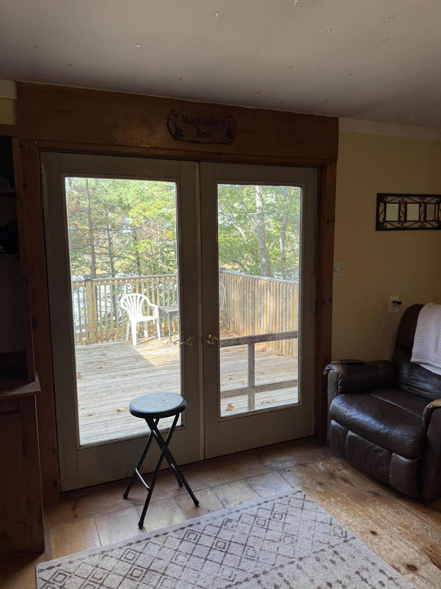 150 Church Farm Road Beddington, ME 04622 - Photo 16 of 29 living room to deck