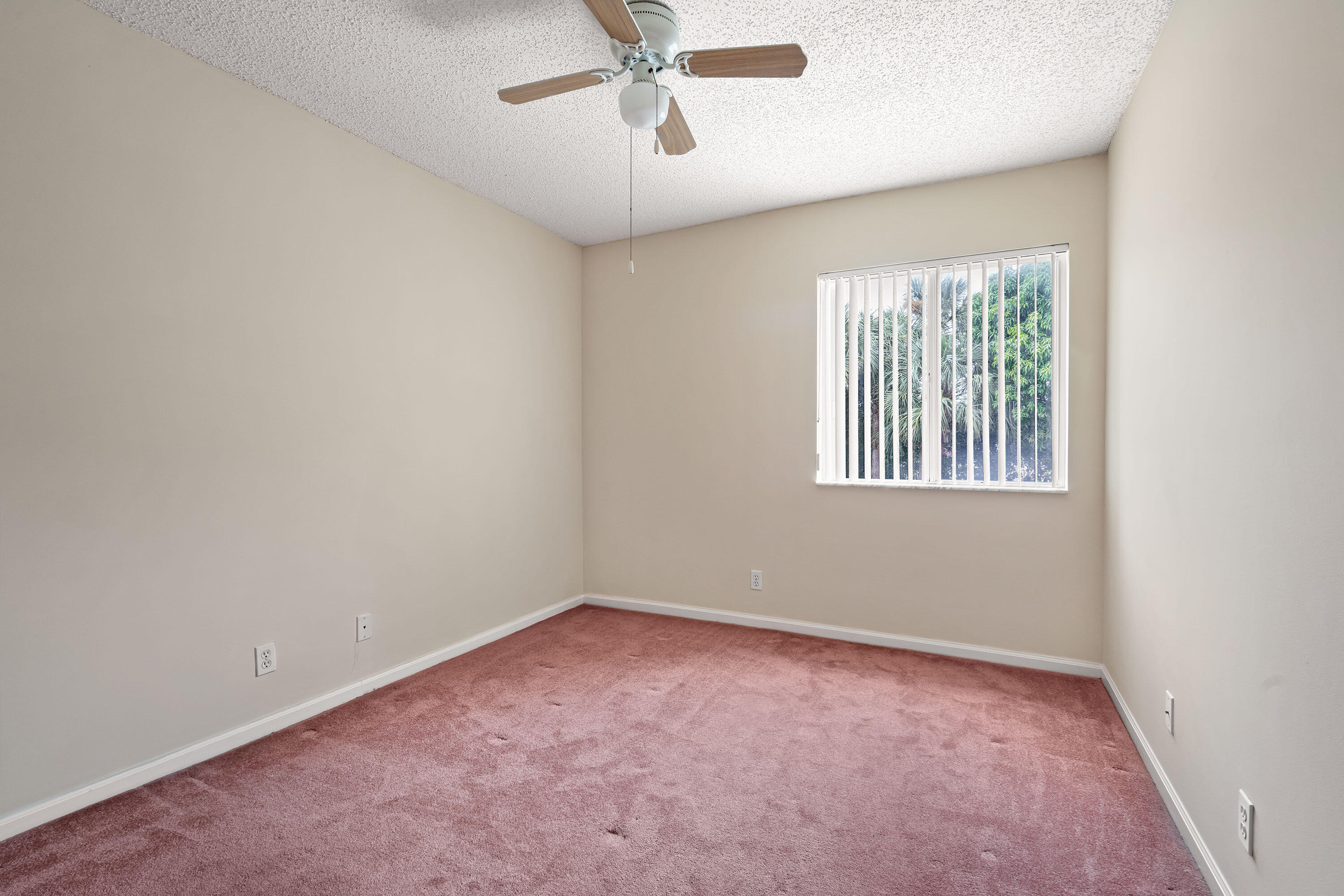 1104 Rialto Drive Boynton Beach, FL 33436 - Photo 19 of 50 an empty room with a window
