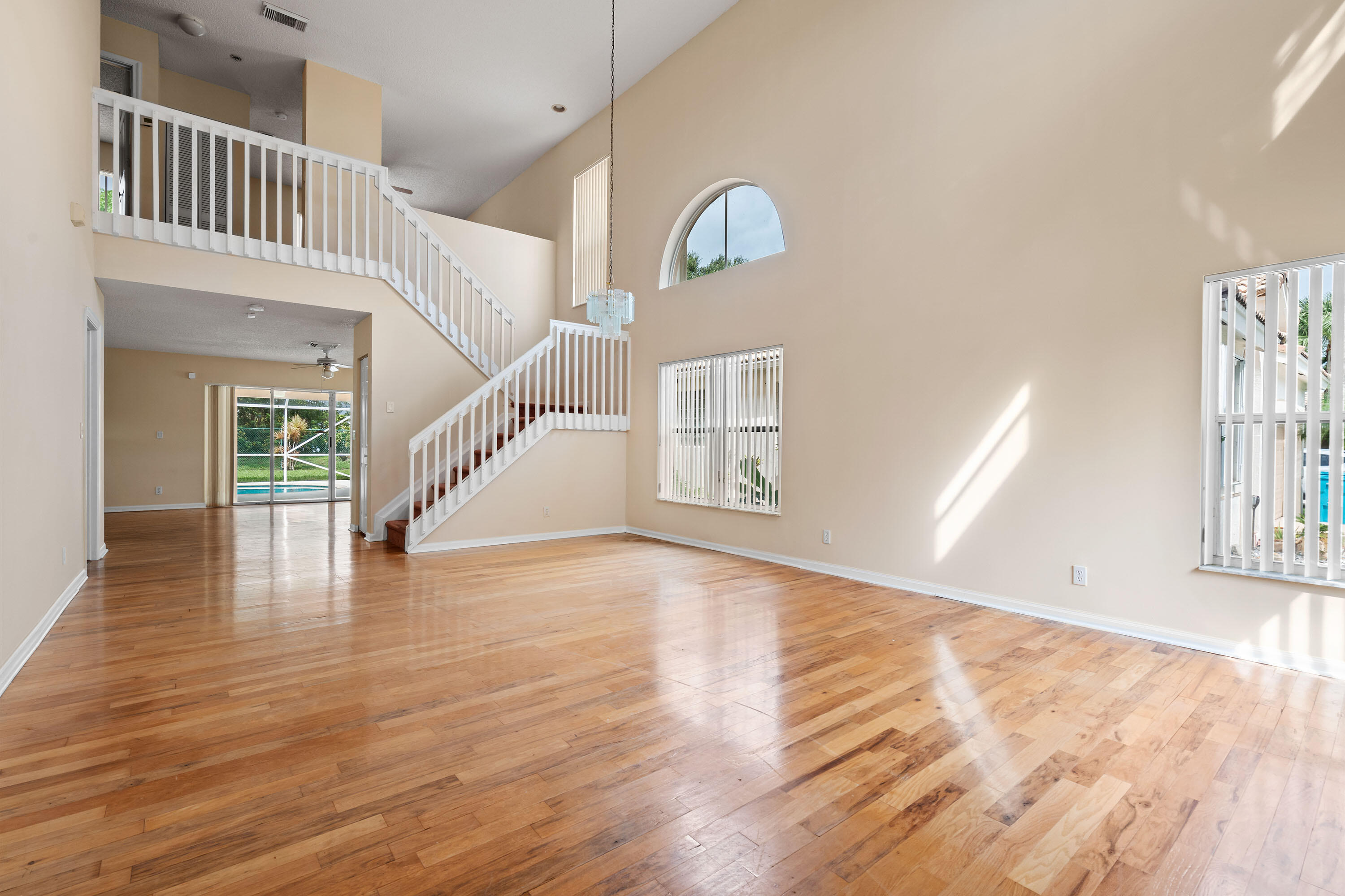 1104 Rialto Drive Boynton Beach, FL 33436 - Photo 2 of 50 a view of entryway and hall with wooden floor