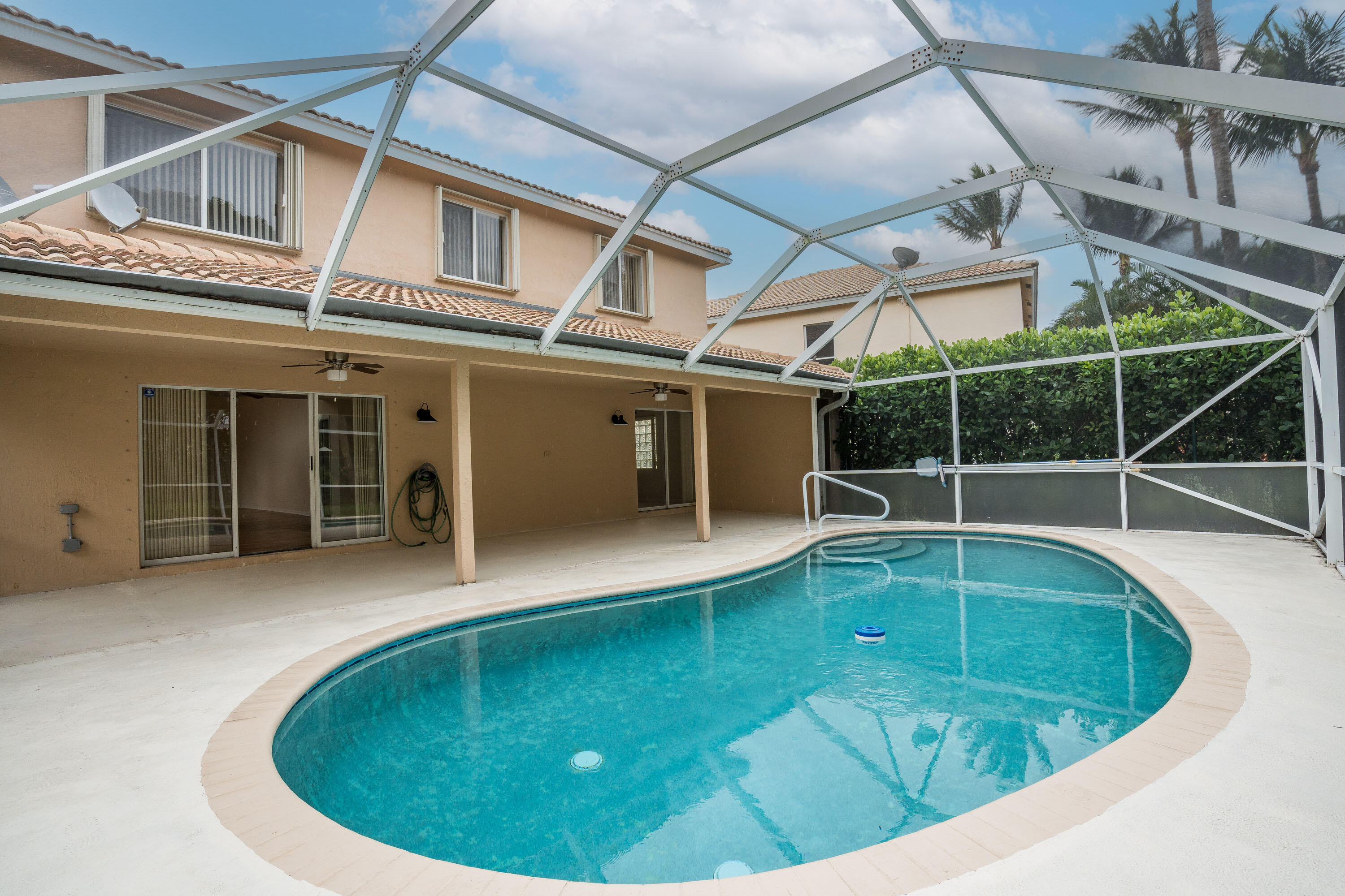 1104 Rialto Drive Boynton Beach, FL 33436 - Photo 33 of 50 a view of a house with pool