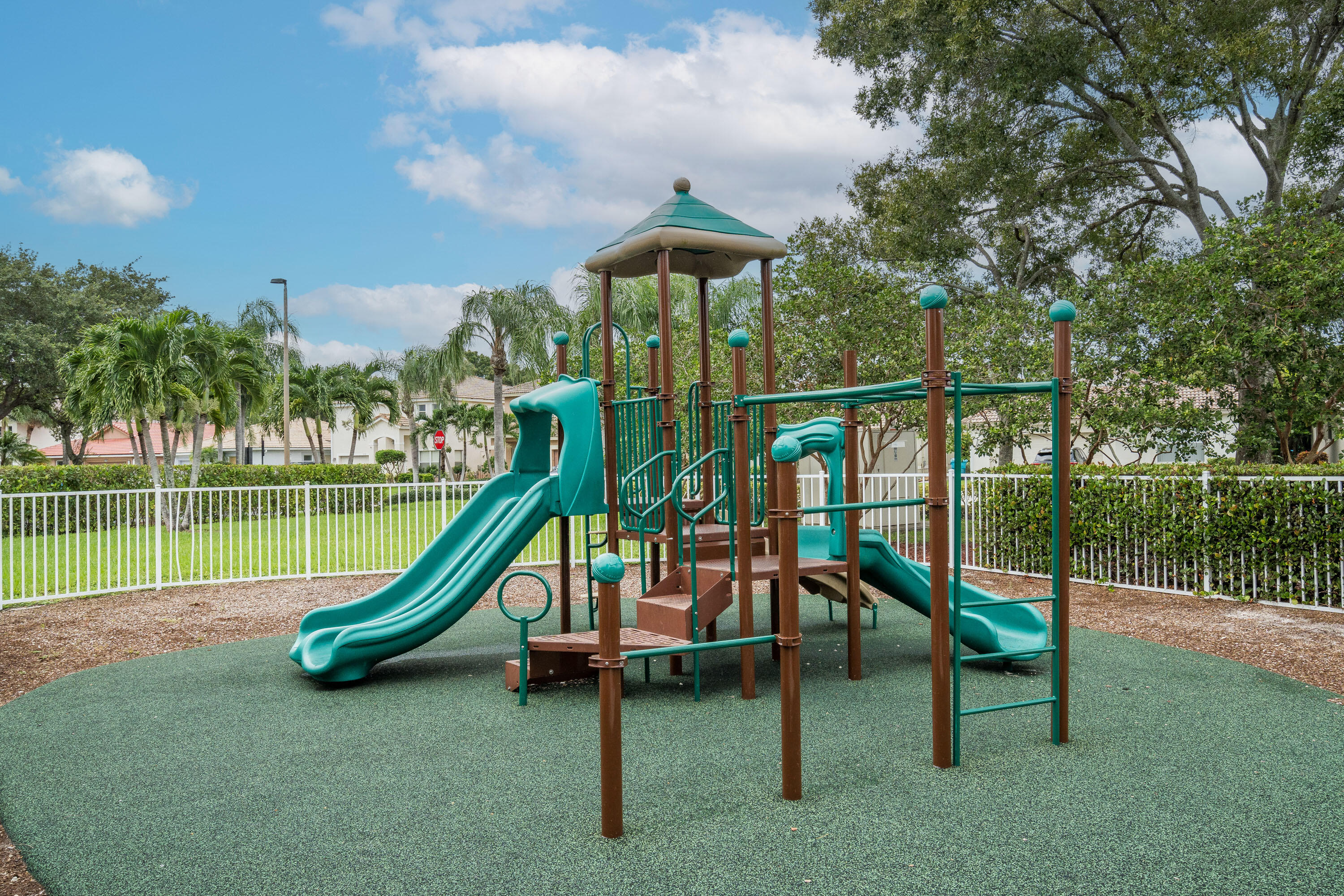 1104 Rialto Drive Boynton Beach, FL 33436 - Photo 47 of 50 a view of a park with slide
