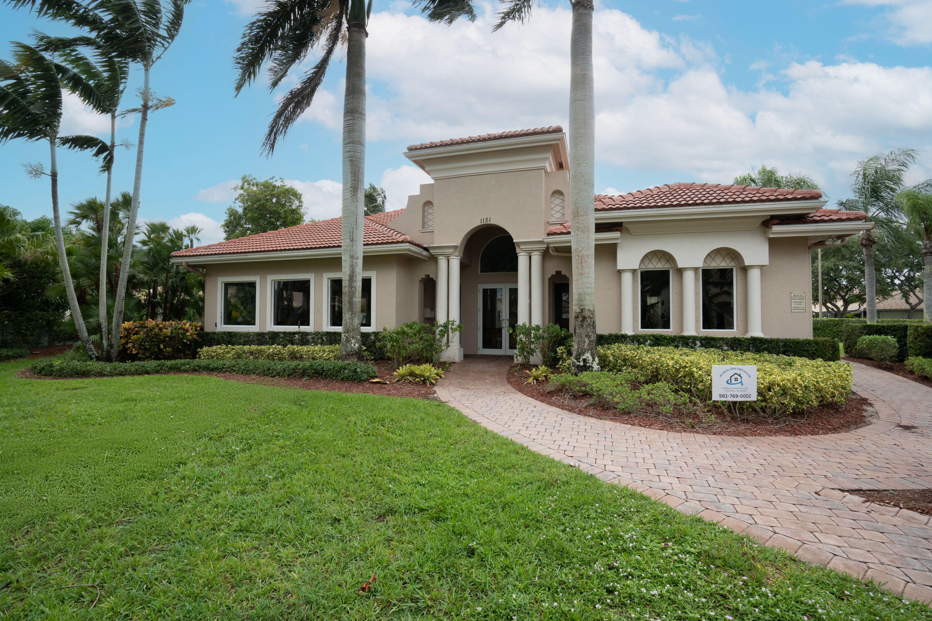 1104 Rialto Drive Boynton Beach, FL 33436 - Photo 49 of 50 a front view of a house with a yard