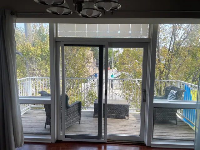 a view of living room window and front door