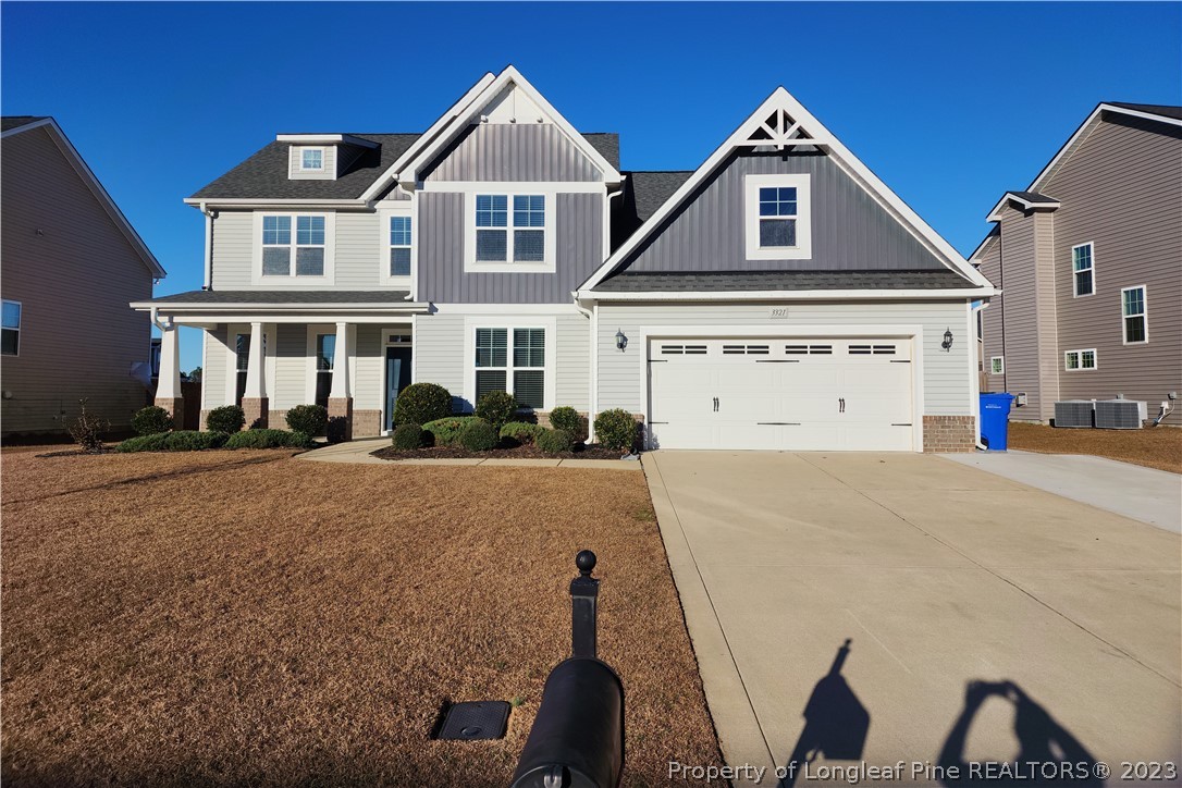 3321 McCoy Cross Fayetteville, NC 28311 - Photo 1 of 49 a front view of a house with a yard
