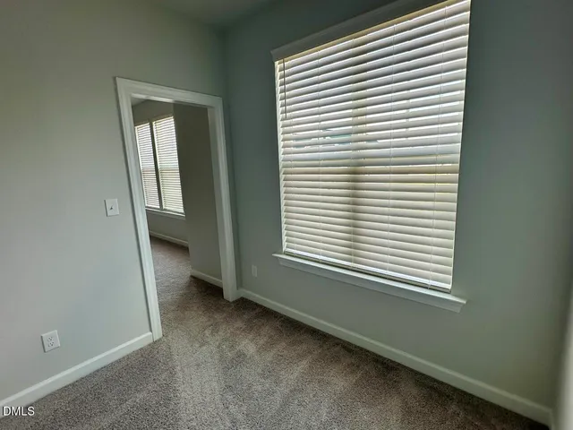 an entryway of a room with a window