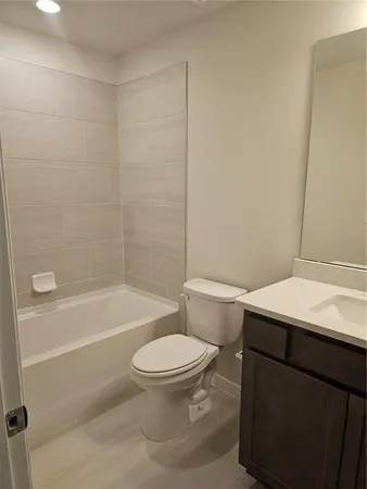 a swimming pool with outdoor seating and yard