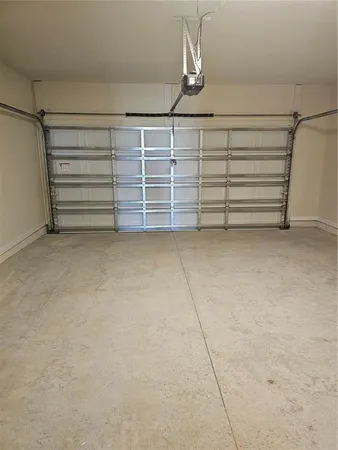 a view of an empty room with racks on the wall