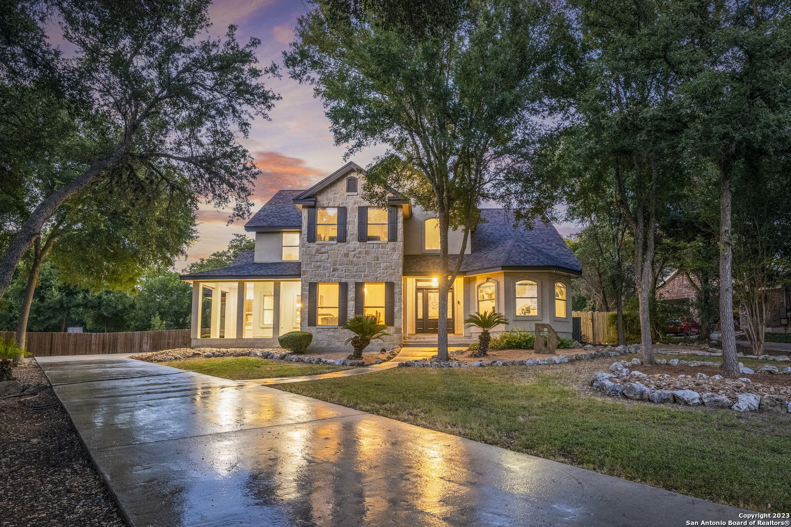 9619 Aster Circle San Antonio, TX 78266 - Photo 1 of 1 a front view of a house with a yard