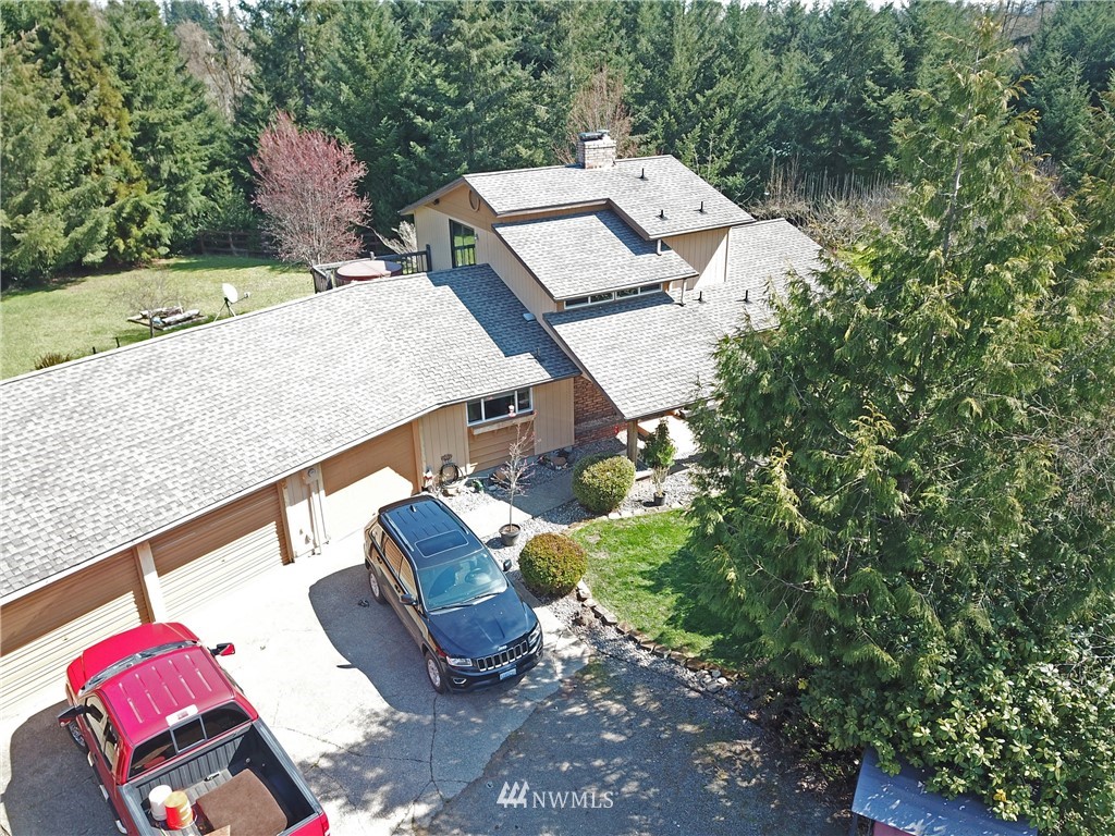 9344 Lundeen Road Southwest Rochester, WA 98579 - Photo 3 of 40 an aerial view of a house with outdoor space