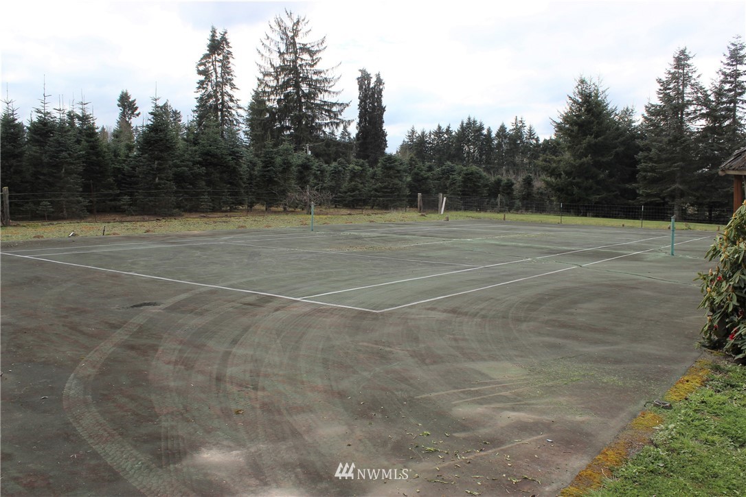 9344 Lundeen Road Southwest Rochester, WA 98579 - Photo 29 of 40 a view of a tennis court