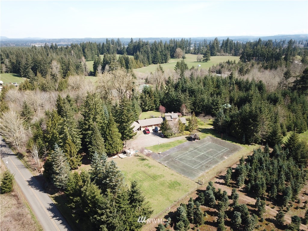 9344 Lundeen Road Southwest Rochester, WA 98579 - Photo 37 of 40 a view of a back yard from a balcony