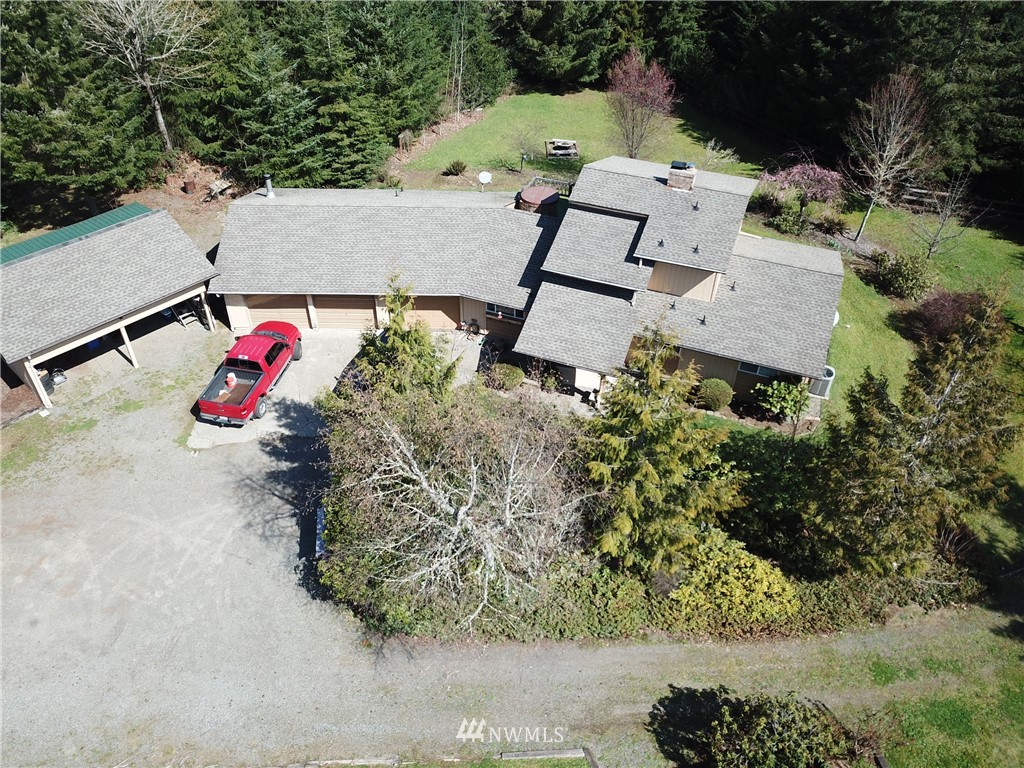 9344 Lundeen Road Southwest Rochester, WA 98579 - Photo 8 of 40 an aerial view of a house with a yard