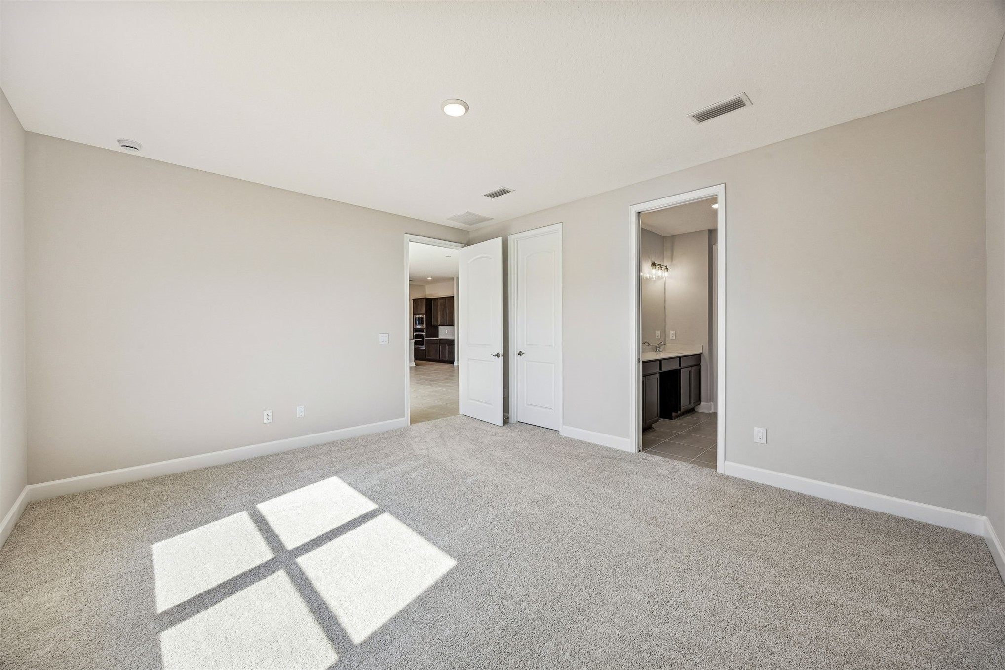 85417 Sandy Rdg Loop Yulee, FL 32097 - Photo 12 of 21 an empty room with windows and closet