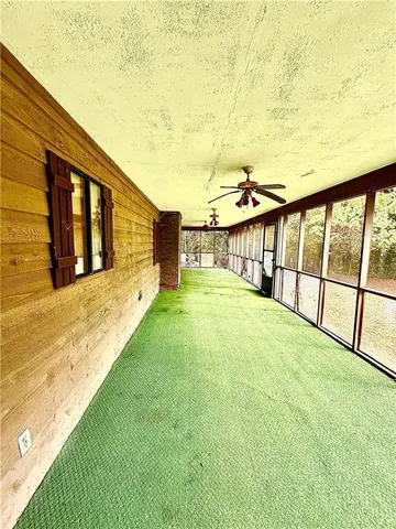 a bedroom with a bed and a fireplace