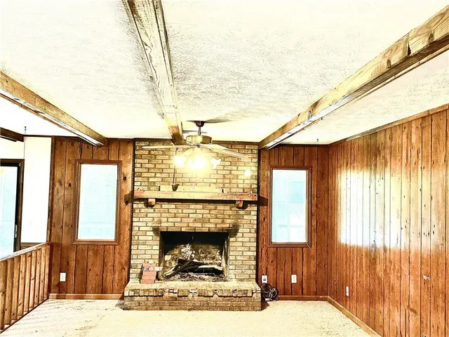 a view of a garage with a wooden door