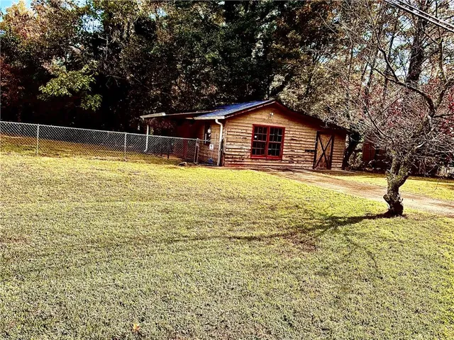 a view of a porch with a floor to ceiling window