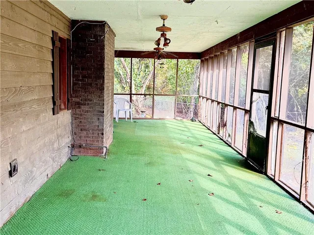 a view of an entryway with garden
