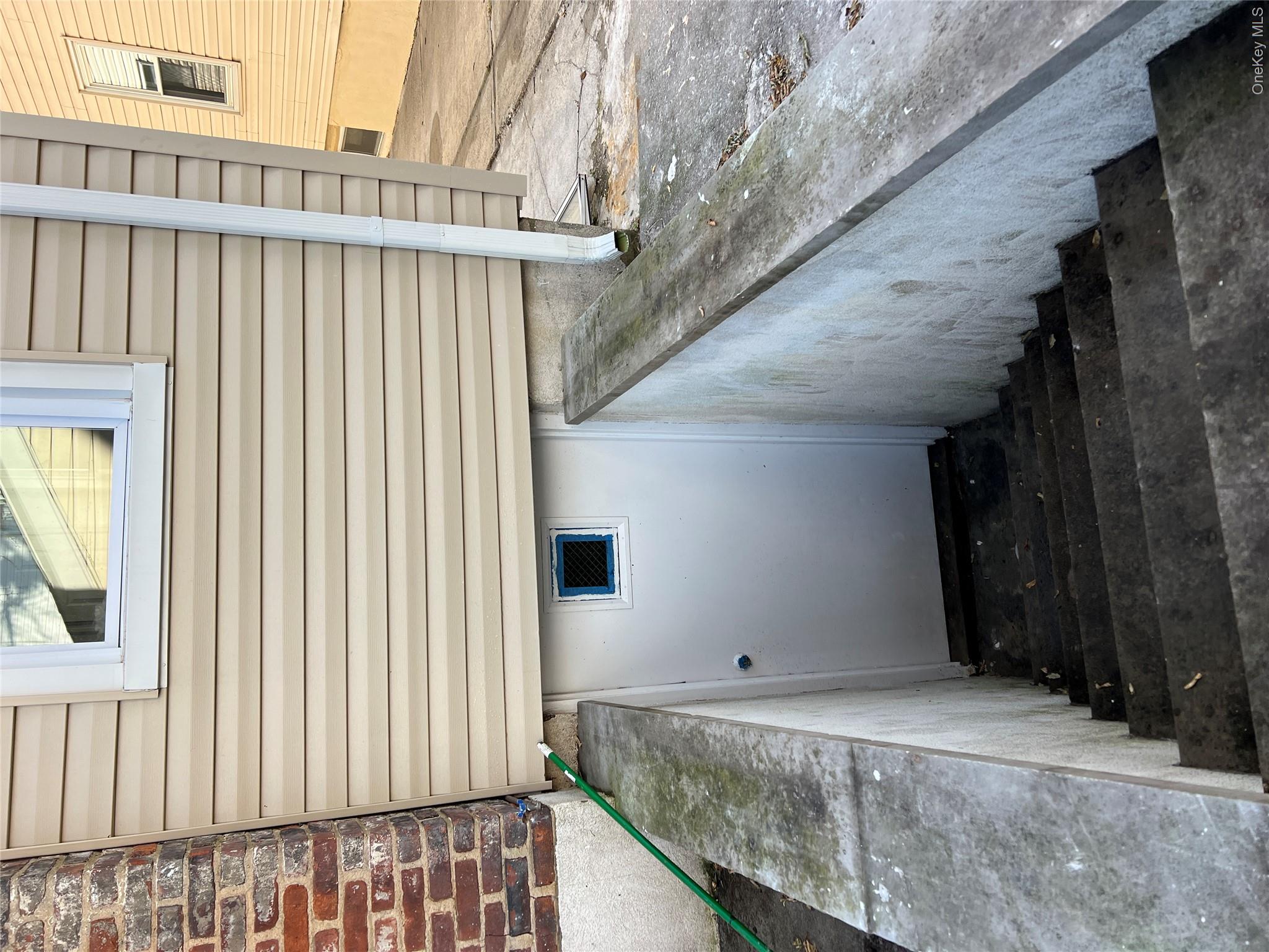 216-25 136th Road, Unit 1 2 AND 3 Queens, NY 11413 - Photo 30 of 43 a view of a entryway door of the house
