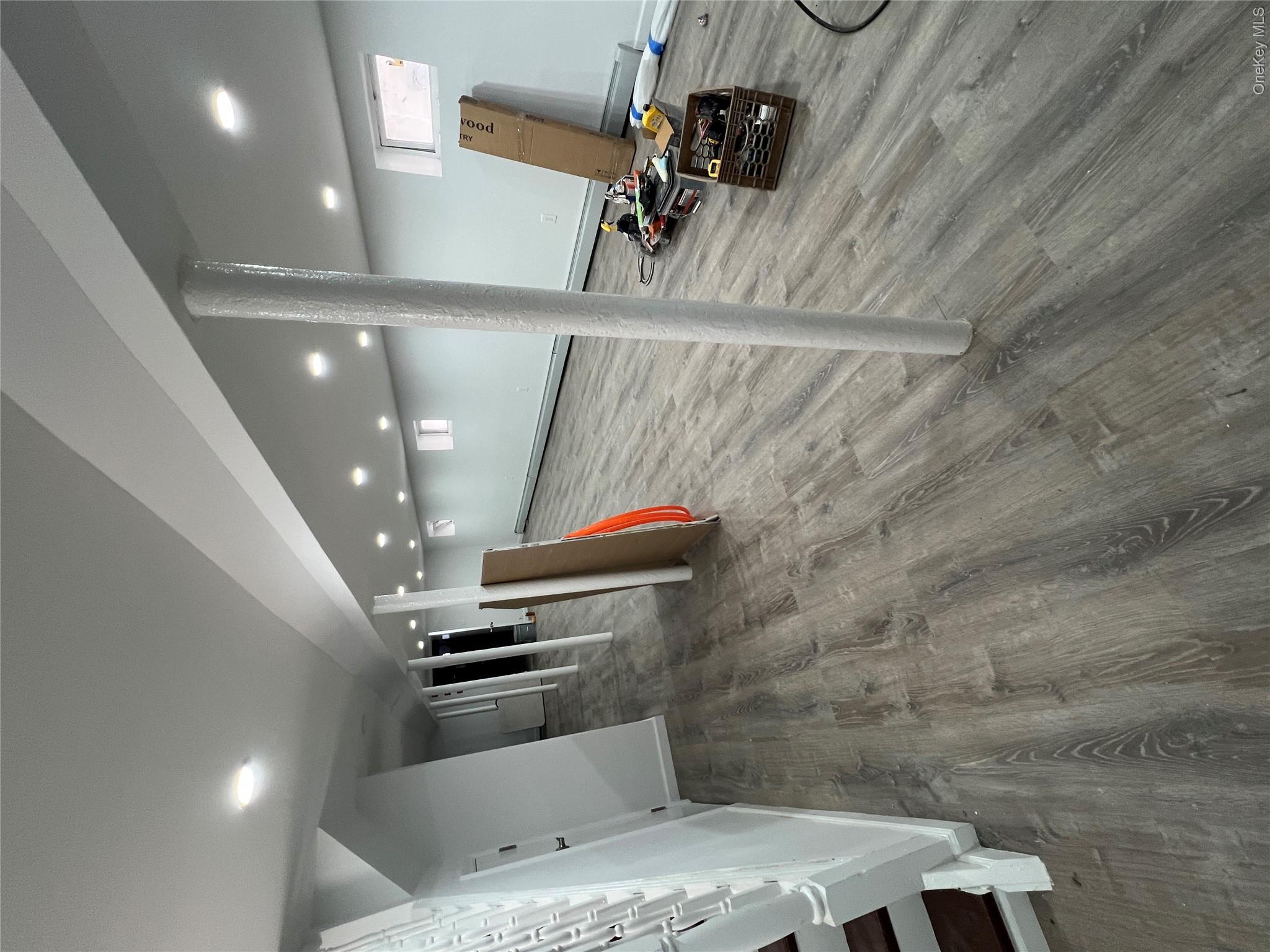 216-25 136th Road, Unit 1 2 AND 3 Queens, NY 11413 - Photo 39 of 43 a view of a hall with stairs