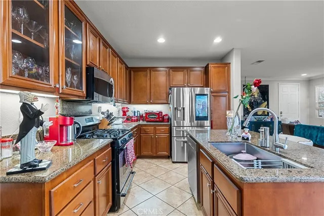 a view of staircase with white walls and a painting on the wall