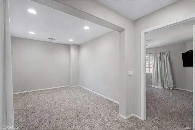 a view of an outdoor sitting area with furniture and garden