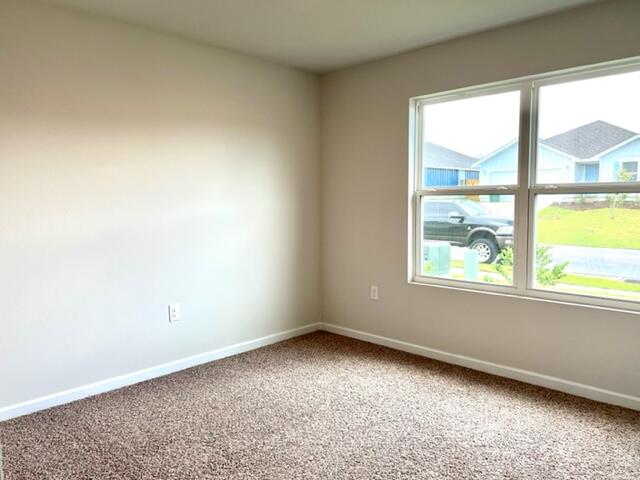 209 Laurel Hill Street Crestview, FL 32539 - Photo 14 of 24 an empty room with a window
