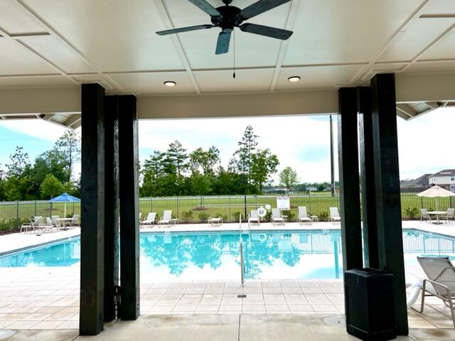 209 Laurel Hill Street Crestview, FL 32539 - Photo 18 of 24 a view of a lot of a floor to ceiling window and an outdoor view