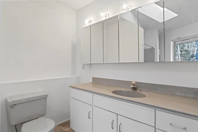 a view of balcony with wooden floor