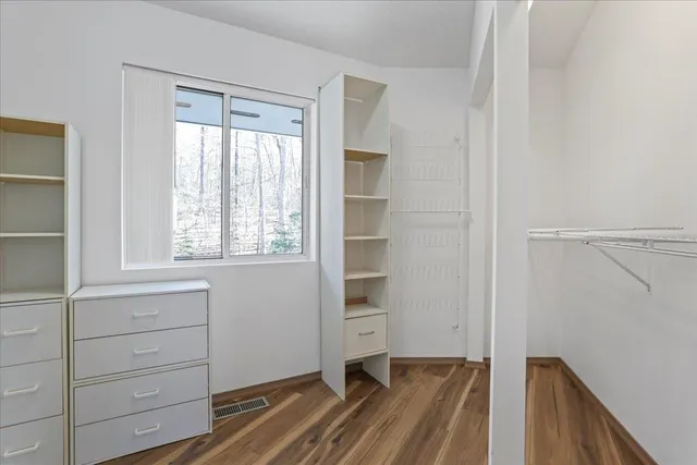 a view of a porch with wooden floor and outdoor space