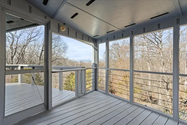 a view of an empty room and window