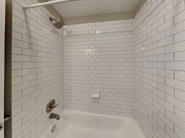 a view of livingroom with hardwood floor and a ceiling fan