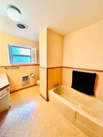 a bathroom with a bathtub