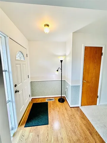 a bathroom with a tub and shower